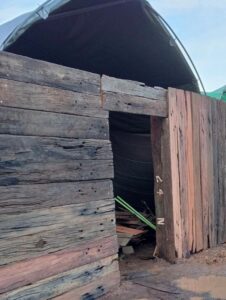 railway sleeper cladding on shed